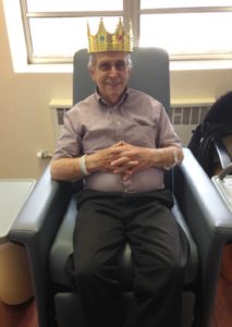 Bob Schoenbauer wears a crown made by nurses during his immunotherapy treatment at Georgetown Lombardi Comprehensive Cancer Center. (Courtesy of Bob Schoenbauer)